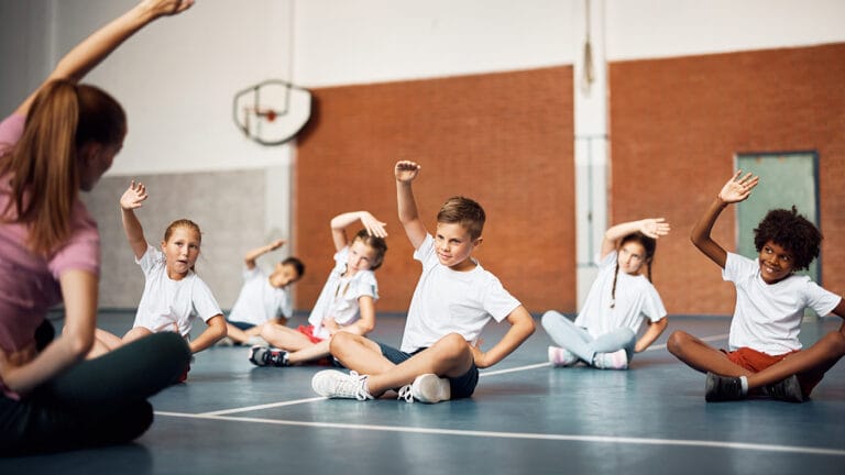 Kids participate in a physical education class