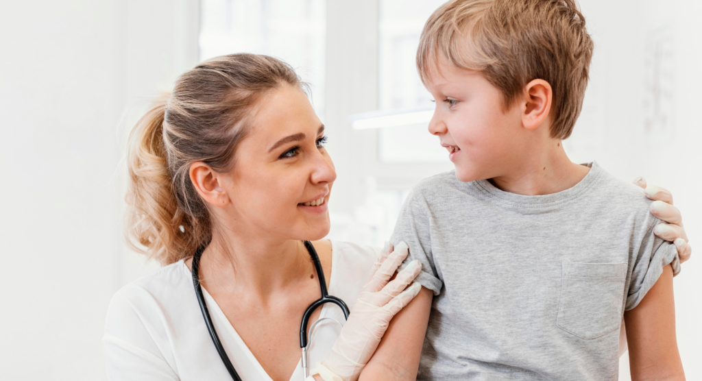 Boy smiling at his doc