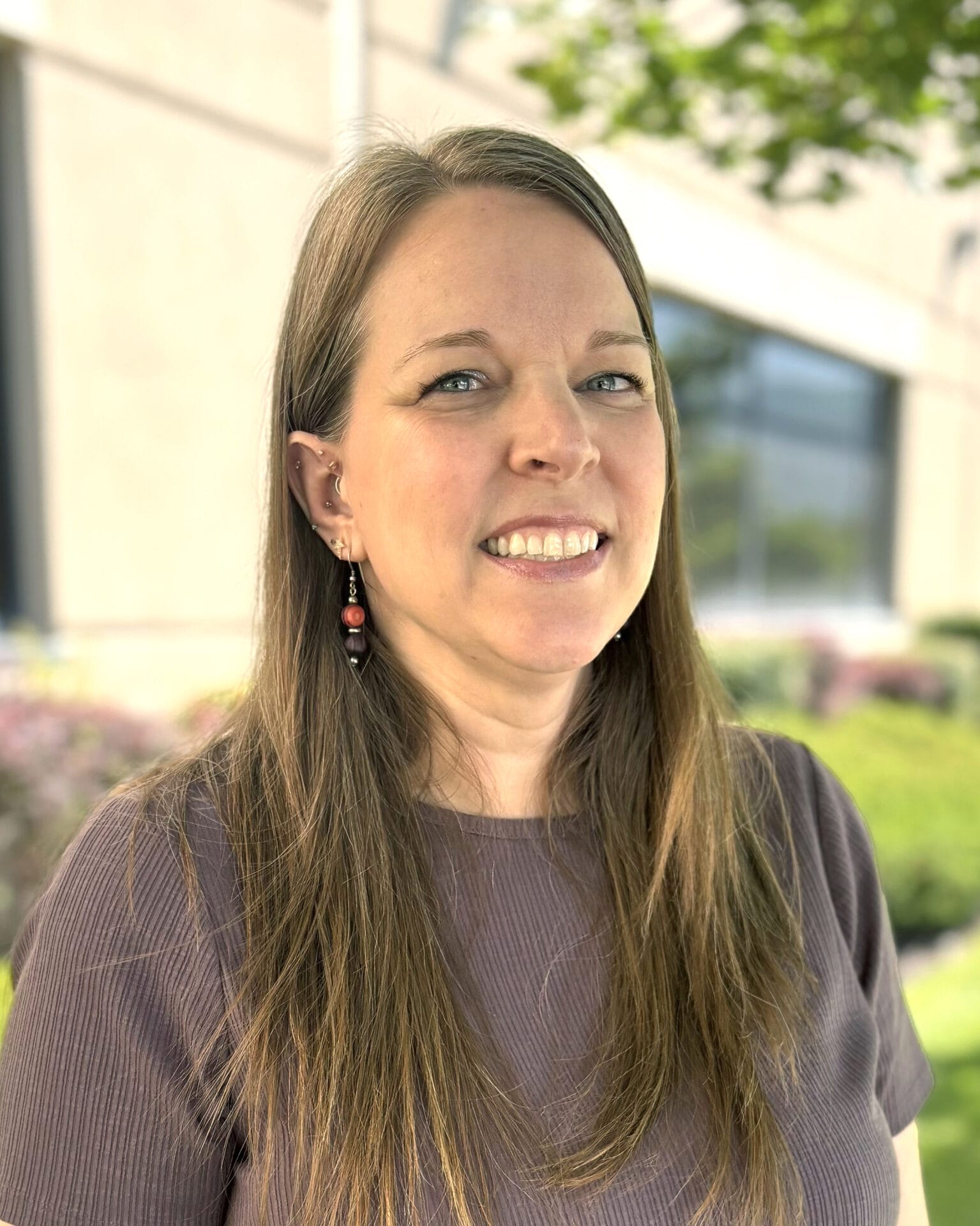 headshot of Vicki VanDenBerghe outside the office