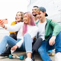 Smiling co-ed group of teens