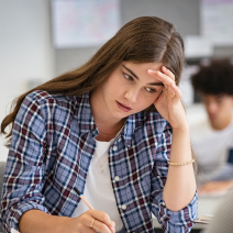 An anxious teen in class