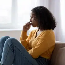 A teen on the couch at home