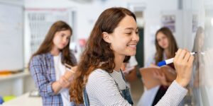 Smiling teen in the classroom