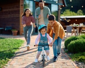 family going on a walk and bike ride